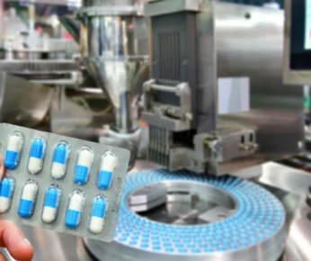 hand-holding-blue-capsule-pack-medicine-pill-productionline